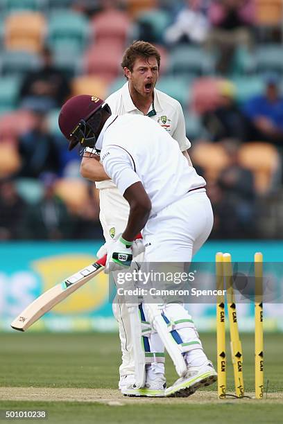 James Pattinson of Australia celebrates dismissing Darren Bravo of the West Indies during day three of the First Test match between Australia and the...