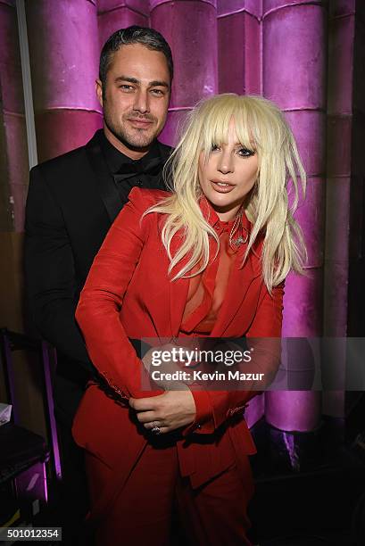 Taylor Kinney and Lady Gaga attend Billboard Women In Music 2015 on Lifetime at Cipriani 42nd Street on December 11, 2015 in New York City.