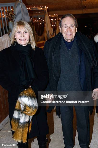 Actors Candice Patou and her husband Robert Hossein attend the "Mario Luraschi's Espace Cavalcade" : Opening Night at Ferme De La Chapelle on...