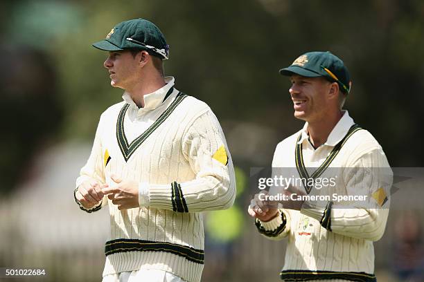 Steve Smith of Australia and David Warner of Australia leave the field at the conclusion of the match during day three of the First Test match...