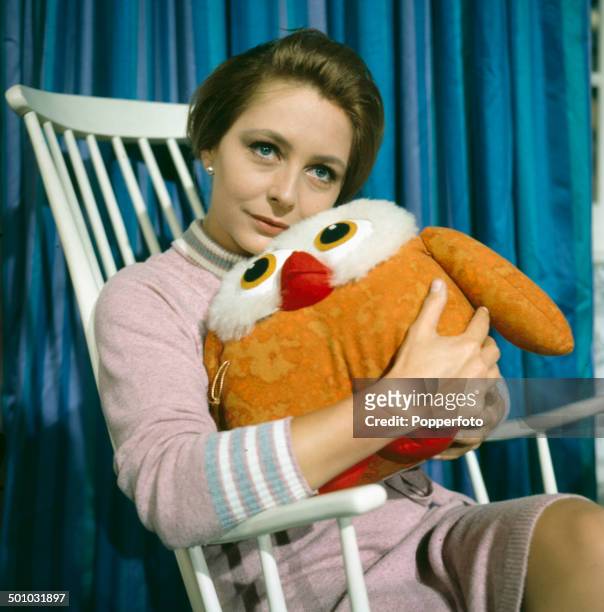 English actress Judy Cornwell pictured holding a stuffed owl toy in a scene from the television drama series 'Armchair Theatre - Poor Cherry' in 1967.