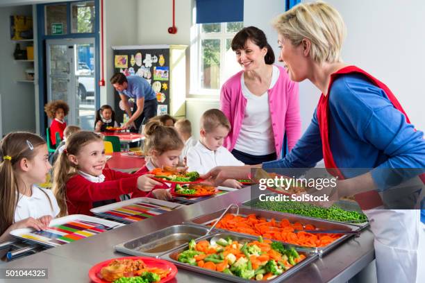 school caferteria line - lunch tray stock pictures, royalty-free photos & images