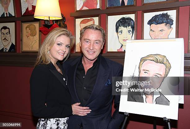 Niamh O'Brien and Michael Flatley attends the unveiling of the Michael Flatley caricature at Sardi's on December 11, 2015 in New York City.