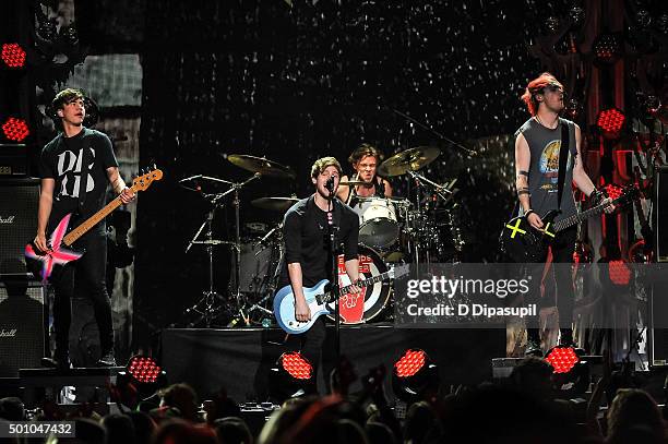 Calum Hood, Luke Hemmings, Ashton Irwin, and Michael Clifford of 5 Seconds of Summer perform onstage during Z100's iHeartRadio Jingle Ball 2015 at...