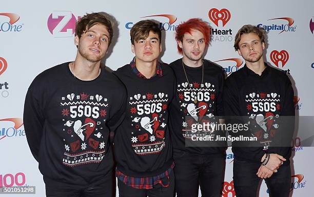 Musicians Luke Hemming, Calum Hood, Michael Clifford, and Ashton Irving of 5 Seconds of Summer attends the Z100's iHeartRadio Jingle Ball 2015 at...