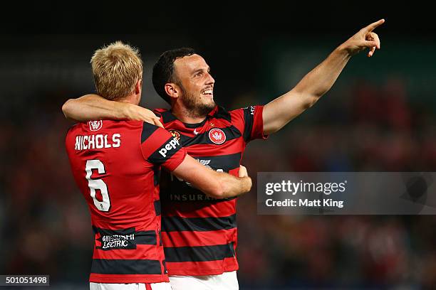 Mark Bridge of the Wanderers celebrates with Mitch Nichols of the Wanderers after scoring the first goal during the round 10 A-League match between...