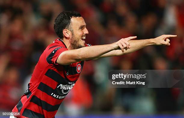 Mark Bridge of the Wanderers celebrates scoring the first goal during the round 10 A-League match between the Western Sydney Wanderers and Melbourne...