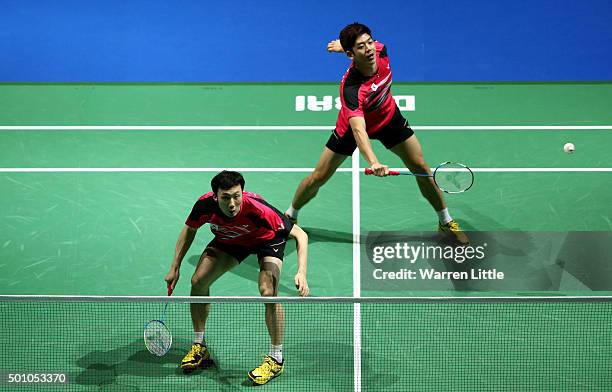 Yong Dae Lee and Yeon Seong Yoo of Korea in action against Mohammad Ahsan and Hendra Setiawan of Indonesia in the Men's Doubles semi final match...
