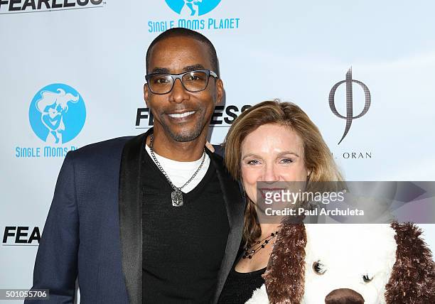 Actor Miguel A. Nunez Jr. And Lisa Langlois attend the Single Moms Planet's 2015 holiday party and toy drive hosted by Playboy Playmates on December...