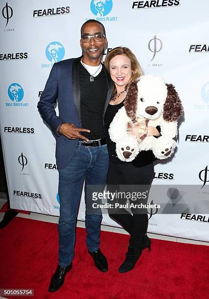 Actor Miguel A. Nunez Jr. And Lisa Langlois attend the Single Moms Planet's 2015 holiday party and toy drive hosted by Playboy Playmates on December...