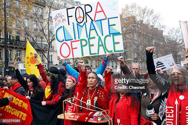 Environmentalists demonstrate during the World Climate Change Conference 2015 on December 12, 2015 in Paris, France. The first universal agreement on...