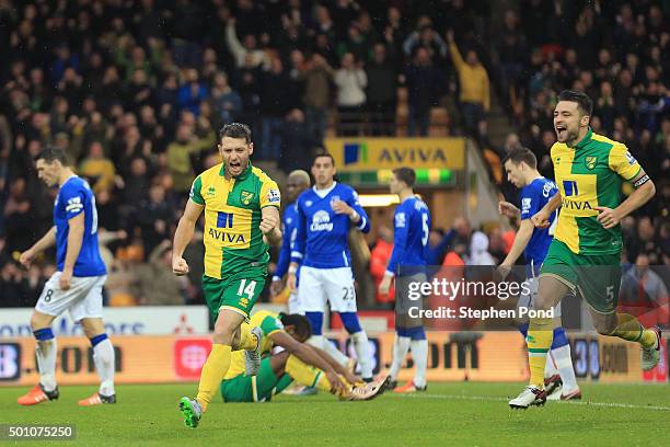 Wes Hoolahan of Norwich City celebrates scoring his team's first goal during the Barclays Premier League match between Norwich City and Everton at...