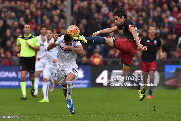 Alberto Facundo Costa of Genoa CFC in action against Anthony Mounier of Bologna FC during the Serie A match betweeen Genoa CFC v Bologna FC at Stadio...