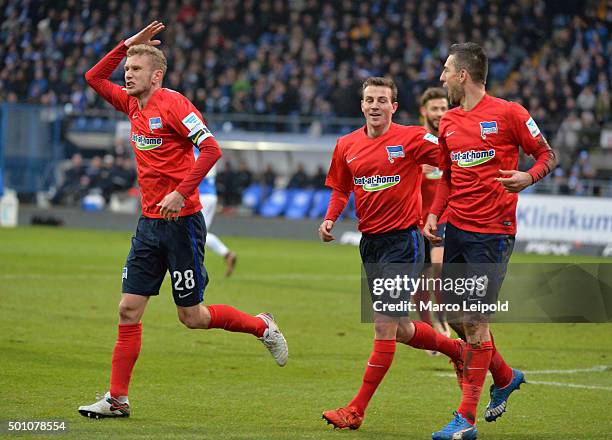 Fabian Lustenberger, Vladimir Darida and Vedad Ibisevic of Hertha BSC celebrate after scoring the 0:1 during the Bundesliga match between SV...