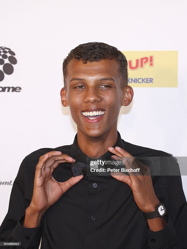 Stromae alias Paul Van Haver, RTL II-Musikshow 'The Dome' 55, TUI-Arena, Hannover, Niedersachsen, Deutschland, Europa, Roter Teppich, Logo, Sänger, Pr