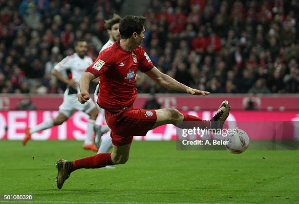 Robert Lewandowski of Bayern Muenchen scores his first goal during the Bundesliga match between FC Bayern Muenchen and FC Ingolstadt at Allianz Arena...
