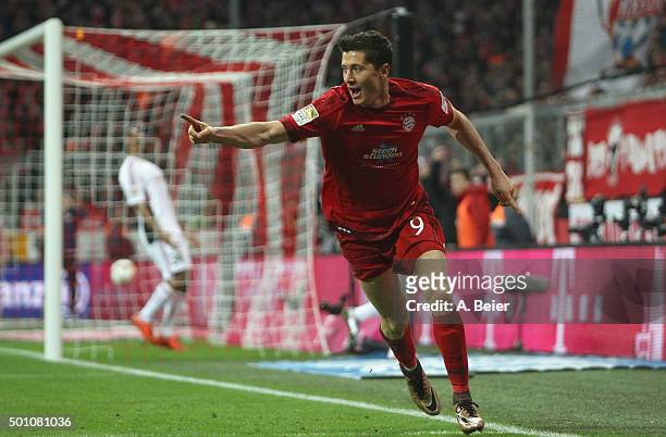 Robert Lewandowski of Bayern Muenchen celebrates his first goal during the Bundesliga match between FC Bayern Muenchen and FC Ingolstadt at Allianz...