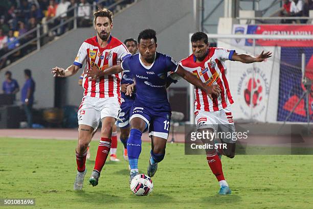 Chennaiyin FC player Jeje Lalpekhlua runs with the ball during the first leg of the semi-final football match between Chennaiyin FC and Atletico de...