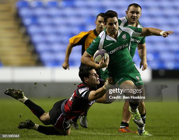 Sean Maitland of London Irish is tackled by Sam Hidalgo-Clyne of Edinburgh during the European Rugby Challenge Cup match between London Irish and...