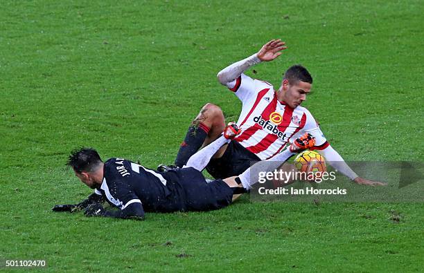 Jack Rodwell of Sunderland challenges Jose Manuel Jurado of Watford during the Barclays Premier League match between Sunderland and Watford at The...