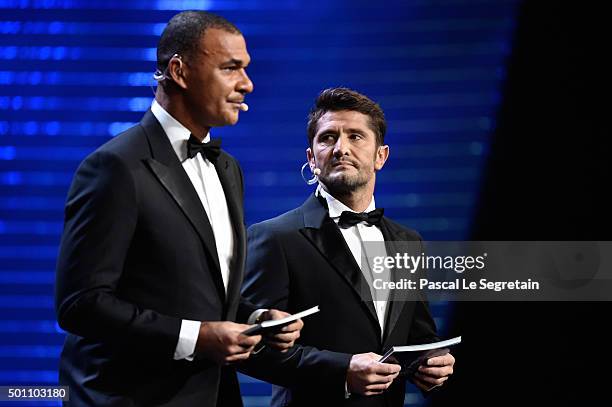 Hosts Ruud Gullit and Bixente Lizarazu are seen on stage during the UEFA Euro 2016 Final Draw Ceremony at Palais des Congres on December 12, 2015 in...