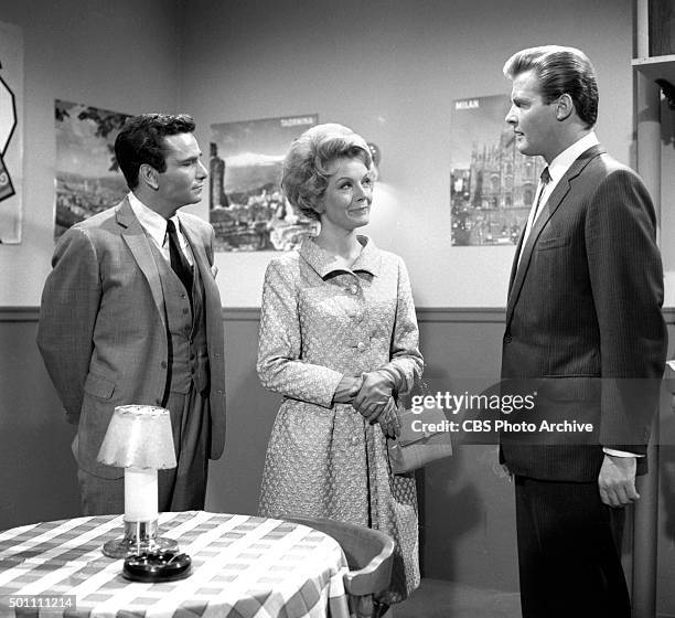 From left: Peter Falk as attorney Daniel J. OBrien, Joanna Barnes as Katie OBrien and Roger Moore as Roger Taney in the TRIALS OF O'BRIEN episode,...