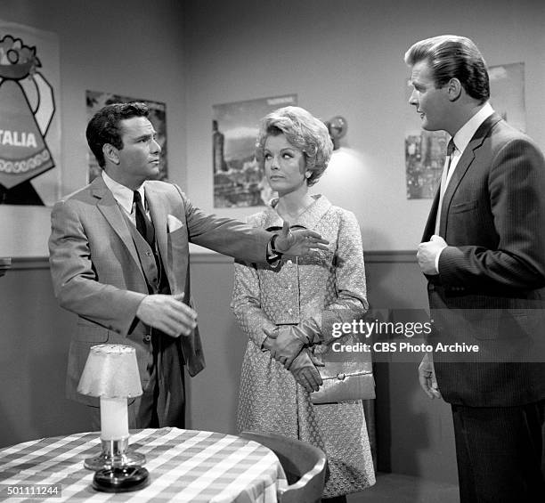 From left: Peter Falk as attorney Daniel J. OBrien, Joanna Barnes as Katie OBrien and Roger Moore as Roger Taney in the TRIALS OF O'BRIEN episode,...