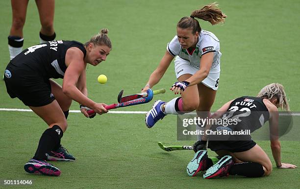 Anne Schroder of Germany and Olivia Merry of New Zealand compete during the semi final match between Germany and New Zealand on day 8 of the Hockey...