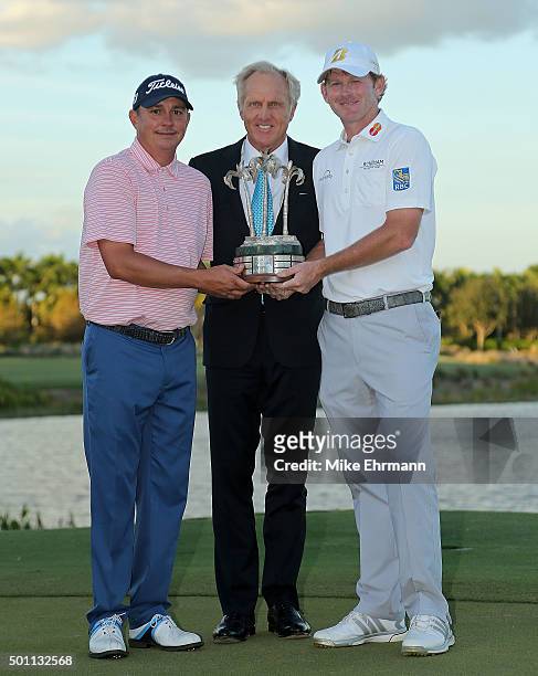 Jason Dufner and Brandt Snedeker pose with Greg Norman and the trophy after winning the Franklin Templeton Shootout at Tiburon Golf Club on December...