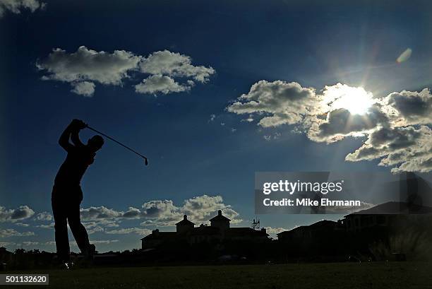 Graeme McDowell of Northern Ireland hits his tee shot on the 18th hole during the final round of the Franklin Templeton Shootout at Tiburon Golf Club...