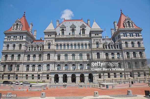 orange walkway below elaborate capitol building - albany new york stock pictures, royalty-free photos & images