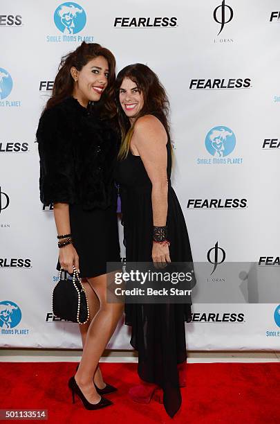 Guest and Lisa Deutsch attend Fearless Man And Single Moms Planet Holiday Party And Toy Drive on December 11, 2015 in Los Angeles, California.