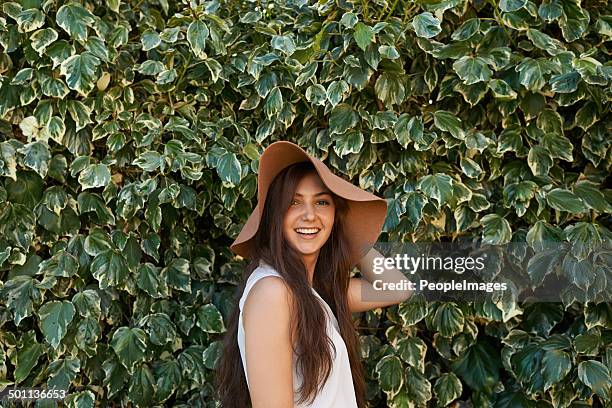 hats are part of my style - brown hair stock pictures, royalty-free photos & images