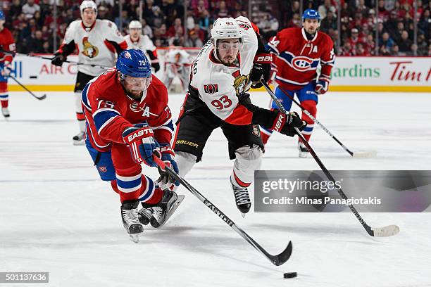 Andrei Markov of the Montreal Canadiens defends the puck against Mika Zibanejad of the Ottawa Senators during the NHL game at the Bell Centre on...