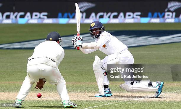 Kusal Mendis of Sri Lanka bats the ball through the onside during day four of the First Test match between New Zealand and Sri Lanka at University...
