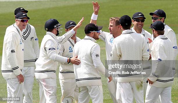 Neil Wagner of New Zealand celebrates taking the wicket of Udara Jayasundera of Sri Lanka with his team mates during day four of the First Test match...