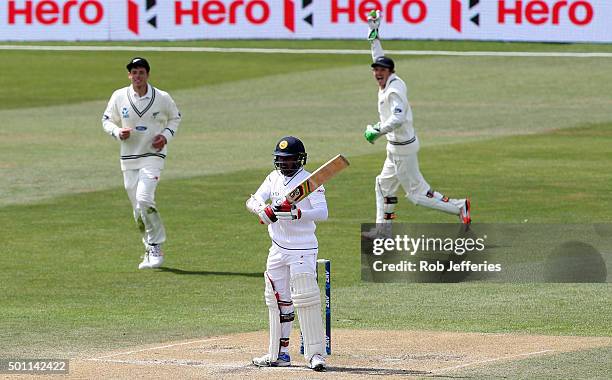 Udara Jayasundera of Sri Lanka is caught behind by BJ Watling of New Zealnd off the bowling of Neil Wagner during day four of the First Test match...
