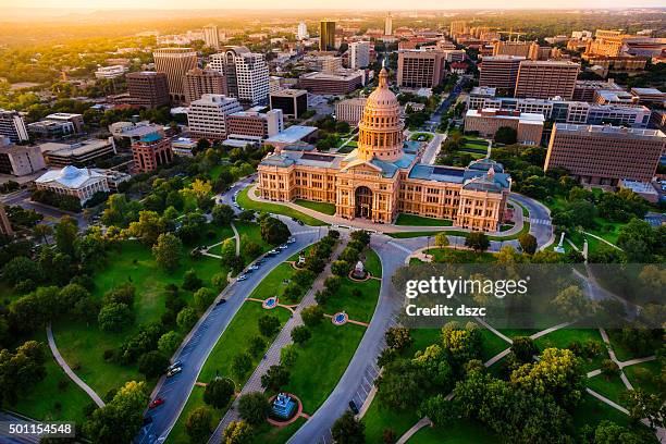 capitol building, aerial skyline, sunset, austin, tx, texas state capital - austin tx capitol building stock pictures, royalty-free photos & images