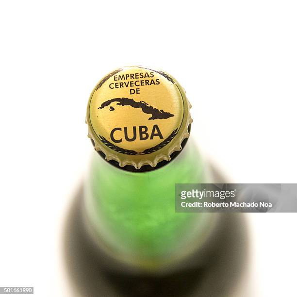 Cuba made products: Branding on lid of Bruja beer bottle with the words empresas cerveceras de cuba and a map of Cuba. Cuba is famous for its...