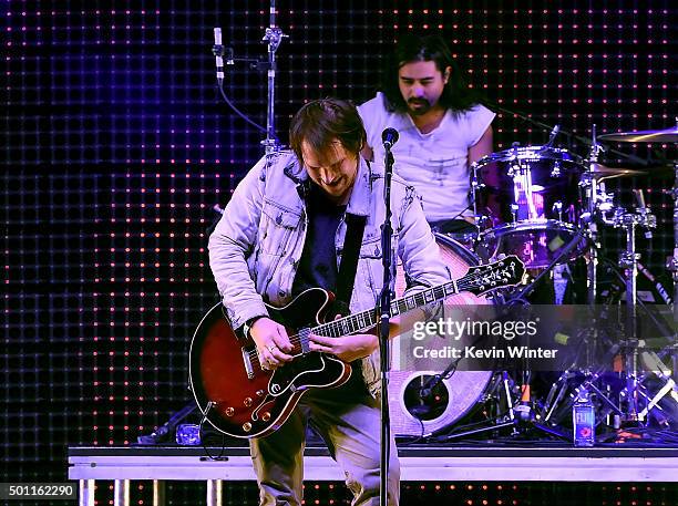 Musicians Brian Aubert and Christopher Guanlao of Silversun Pickups perform onstage during 106.7 KROQ Almost Acoustic Christmas 2015 at The Forum on...