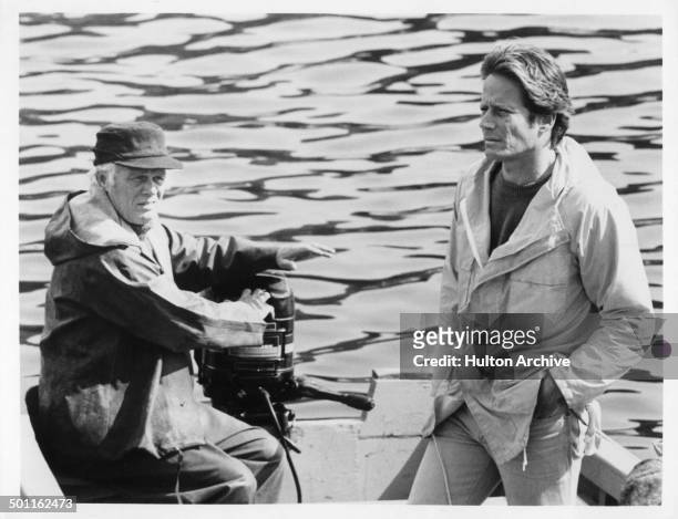 Richard Widmark and Peter Strauss look on the beach in the Television movie "A Whale for the Killing" circa 1981.