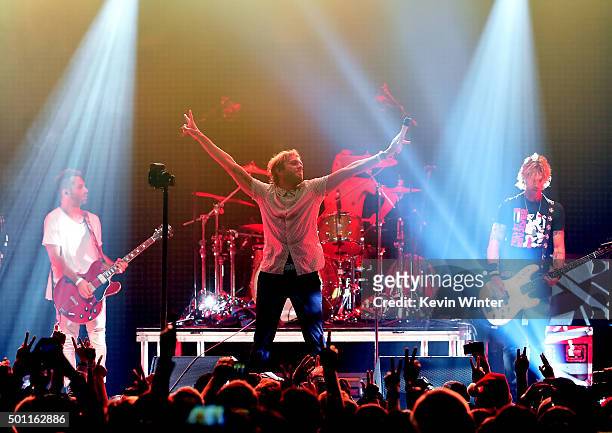 Musicians Drew Stewart, Aaron Bruno, Isaac Carpenter and Duff McKagan of Awolnation perform onstage during 106.7 KROQ Almost Acoustic Christmas 2015...