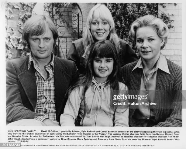 David McCallum, Lynn-Holly Johnson, Kyle Richards and Carroll Baker pose as the Curtis family for the Walt Disney movie "The Watcher in the Woods"...