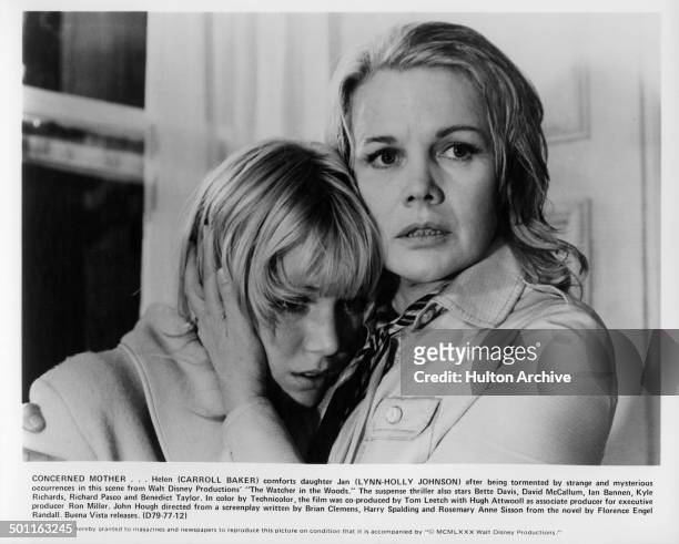 Lynn-Holly Johnson is held by Carroll Baker as she looks scared in a scene for the Walt Disney movie "The Watcher in the Woods" circa 1979.