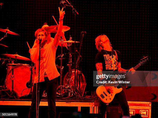 Musicians Aaron Bruno and Duff McKagan of Awolnation perform onstage during 106.7 KROQ Almost Acoustic Christmas 2015 at The Forum on December 12,...