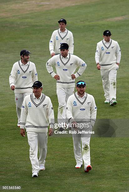 Brendon McCullum leads off part of his team at the end of day four of the First Test match between New Zealand and Sri Lanka at University Oval on...