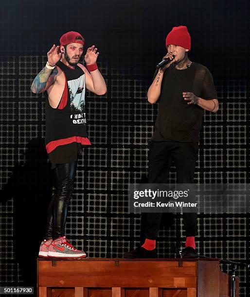 Musicians Josh Dun and Tyler Joseph of Twenty One Pilots perform onstage during 106.7 KROQ Almost Acoustic Christmas 2015 at The Forum on December...