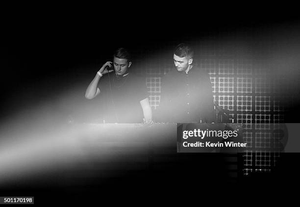 Recording artists Guy Lawrence and Howard Lawrence of Disclosure perform onstage during 106.7 KROQ Almost Acoustic Christmas 2015 at The Forum on...