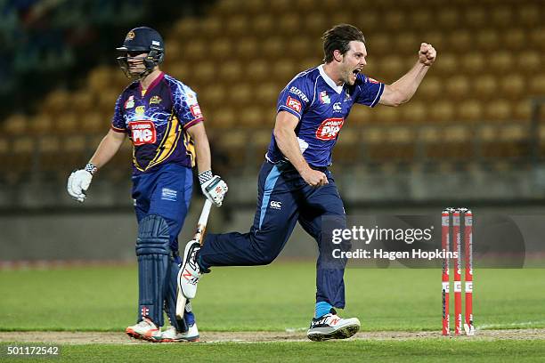 Mitchell McClenaghan of the Aces celebrates the wicket of Neil Broom of the Volts during the Georgie Pie Super Smash Final match between the Auckland...