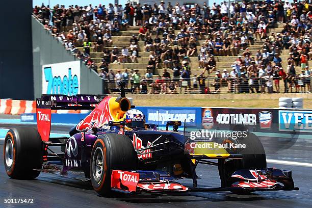 Daniel Ricciardo of Infiniti Red Bull Racing drives during the Perth Speed Fest at Perth Motorplex on December 13, 2015 in Perth, Australia.